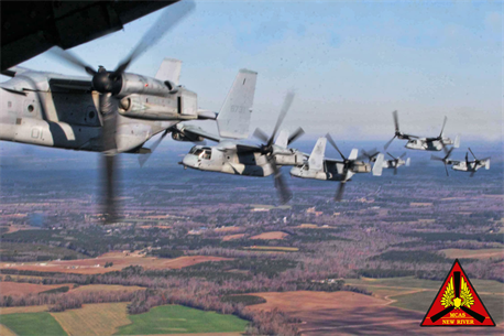 MARINE CORPS AIR STATION NEW RIVER, N.C. - Marines from Marine Medium Tiltrotor Squadron 365 fly 8 MV-22B Ospreys in an echelon right formation on their way back to Marine Corps Air Station New River.