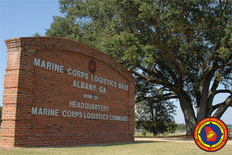 MARINE CORPS LOGISTICS BASE ALBANY, Ga. - 'Dubber's Oak' greets everyone who visits Marine Corps Logistics Base Albany. In 1952, Col. A. E. Dubber found the majestic oak tree and insisted that the base headquarters building be built about 600 yards away, centered on the tree. The tree is known nearly six decades later as 'Dubber's Oak' and is estimated to be more than 175 years old.